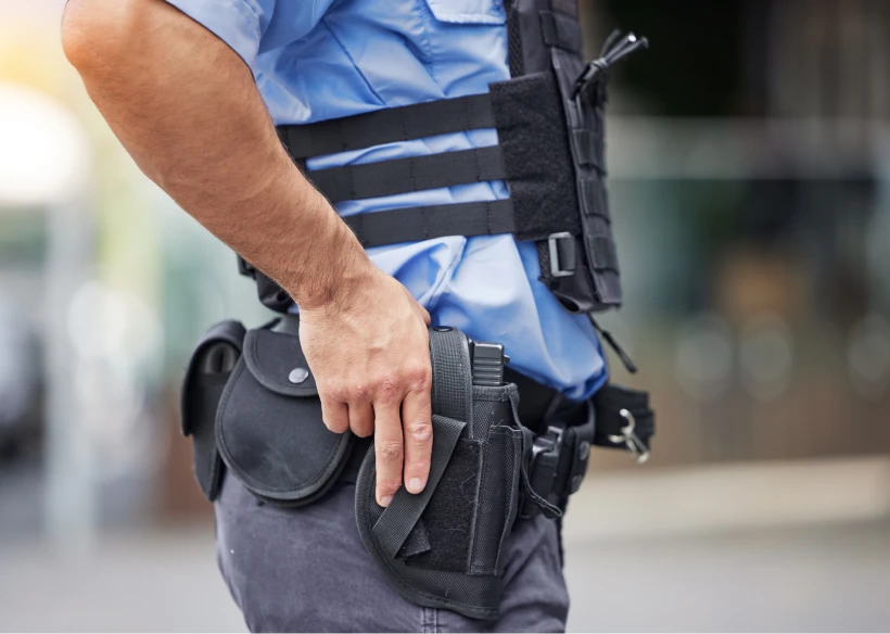 Officer in uniform with weapon holster