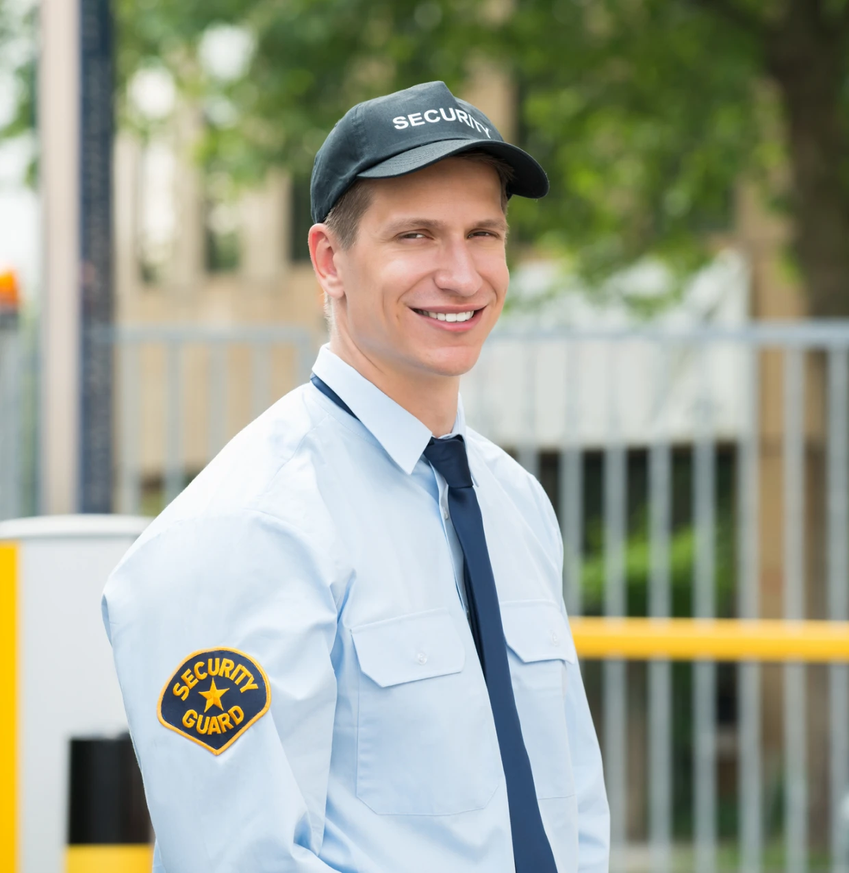 Security guard smiling outdoors